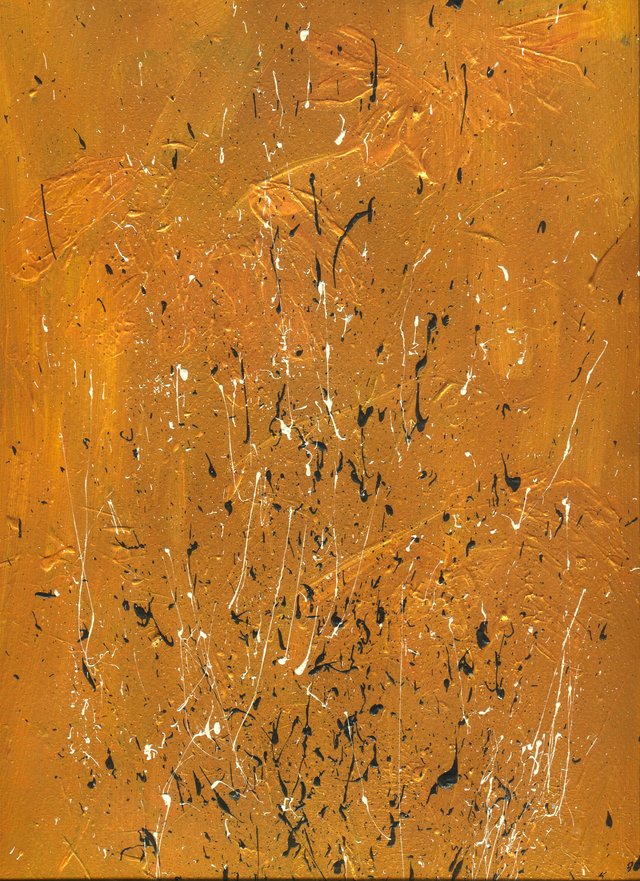 Abstract on ochre: black and white flecks and scratches over a rusty orange ground.